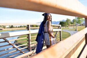 girl in jumpsuit with cap and gown