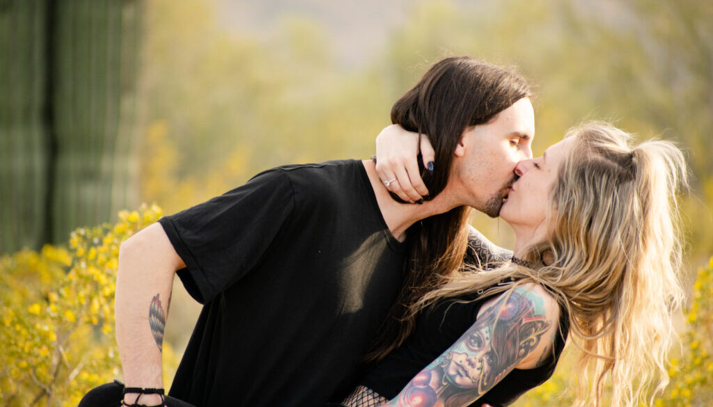 couple kissing in Waddell, AZ desert