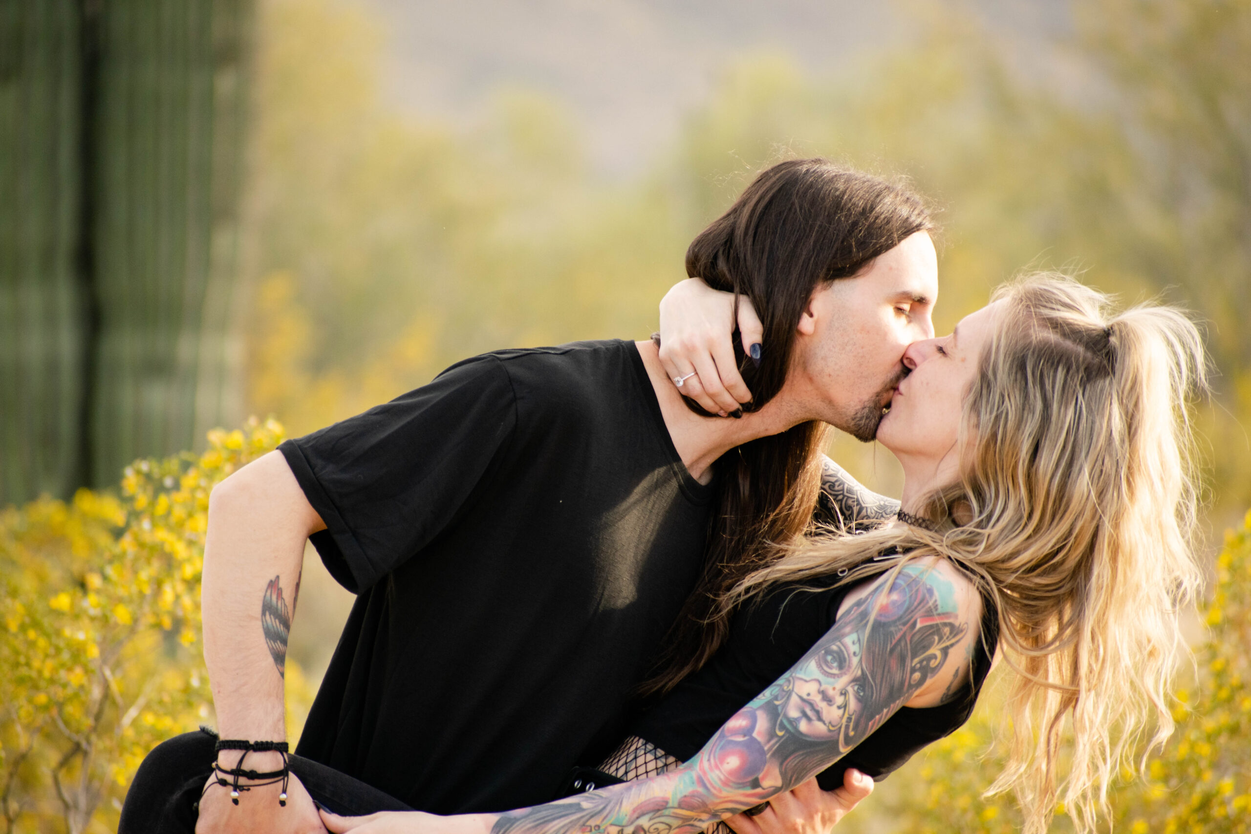 couple kissing in Waddell, AZ desert