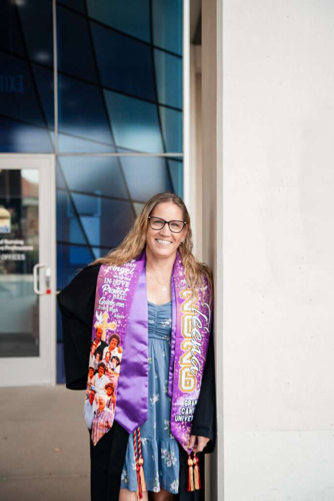 Adult graduate Teena smiling during her GCU graduation photoshoot