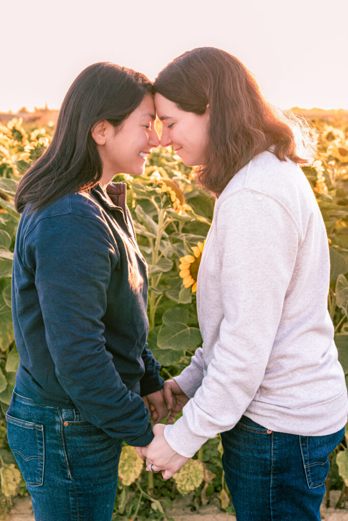 Couple enjoying fall photos among sunflowers in Arizona